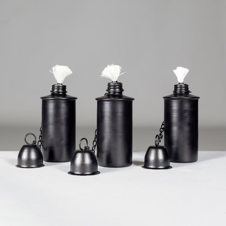 A 3-pack metal saguaro torch canister set.