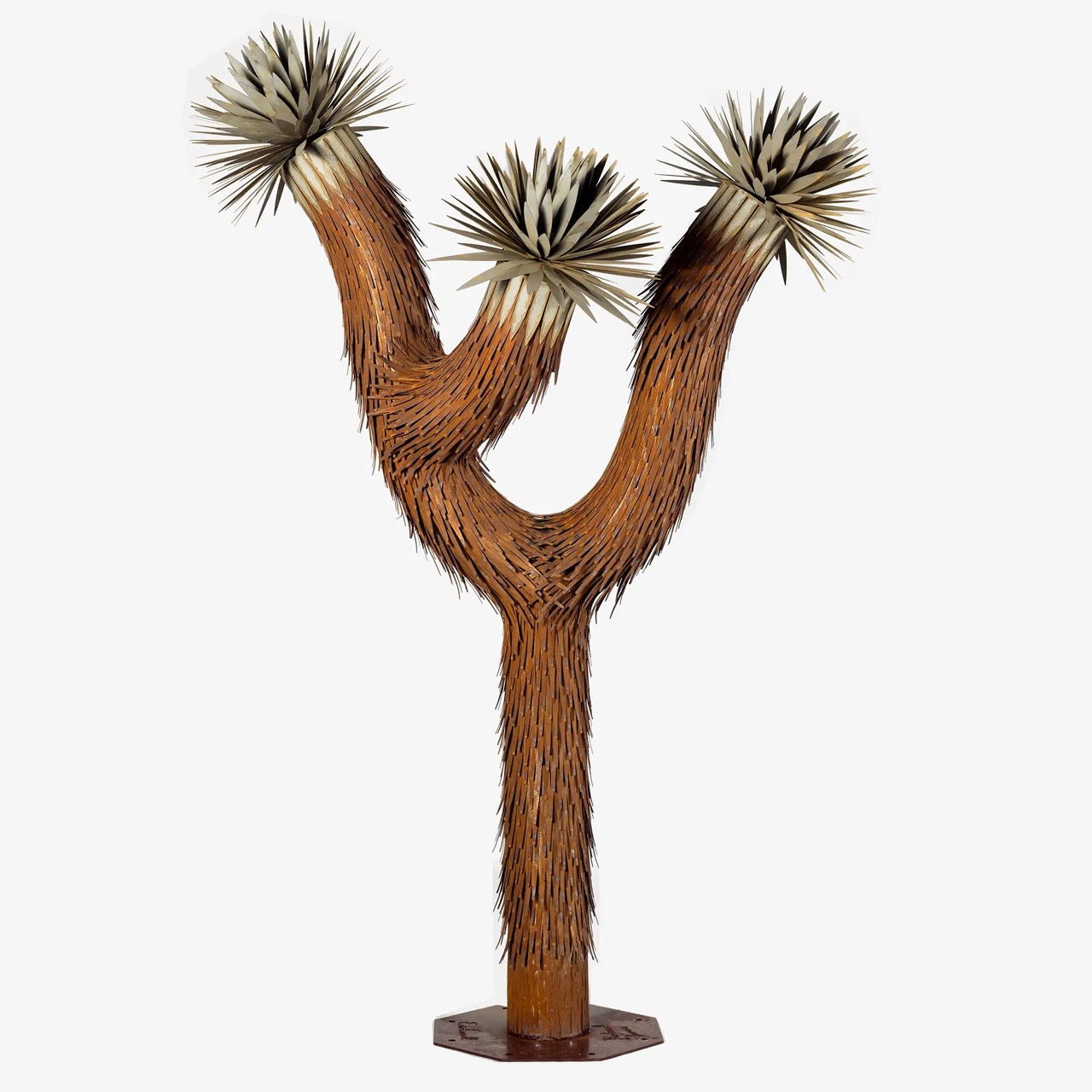 An 8ft metal joshua tree sculpture with a nature inspired, metallic design.