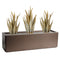 Decorative planter with three tall, spiky plants on a white background